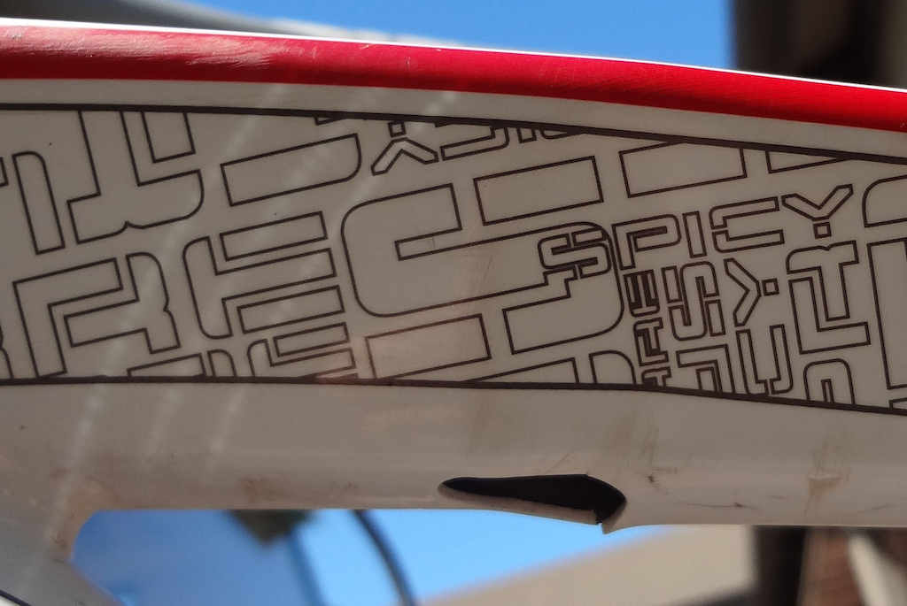 Broken Frame. Dented and cracked on the top tube around the first internal cable entry.