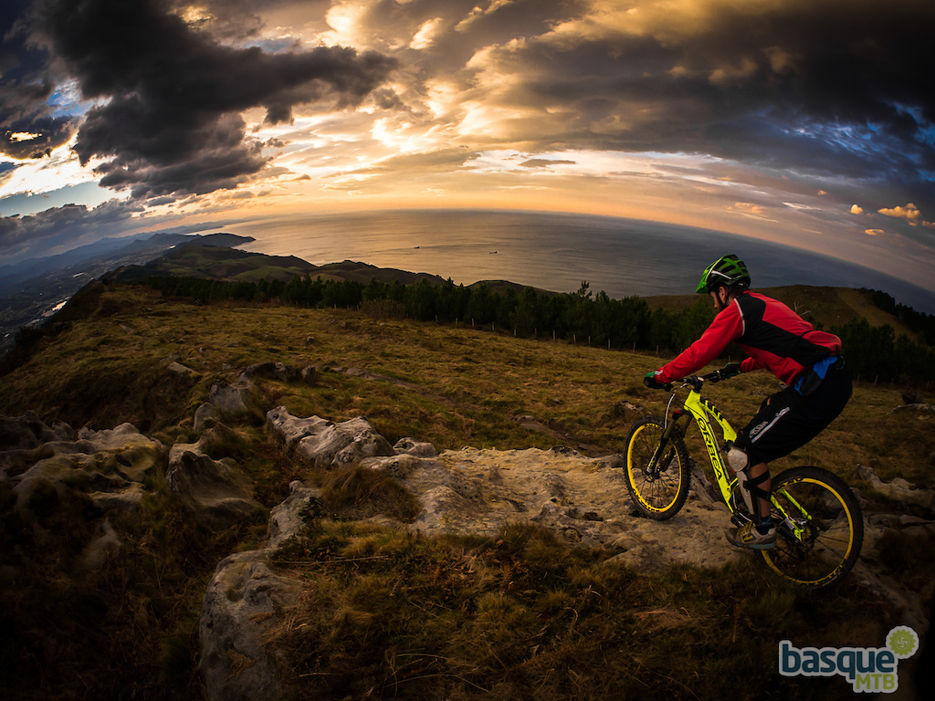 Riding the Orbea Rallon at sunset on the trails it was designed on.