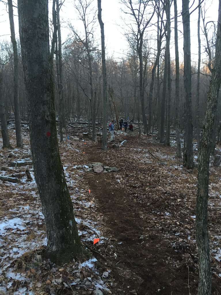 NMBA doing trail work, rerouting around the mud hole