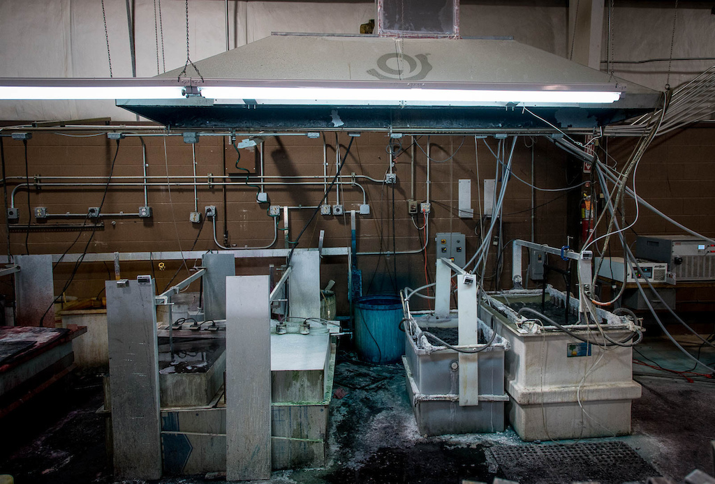 The anodizing tanks. It s an electro-mechanical process that bonds color to the porous aluminum. Think of it as dipping aluminum easter eggs in dye.
