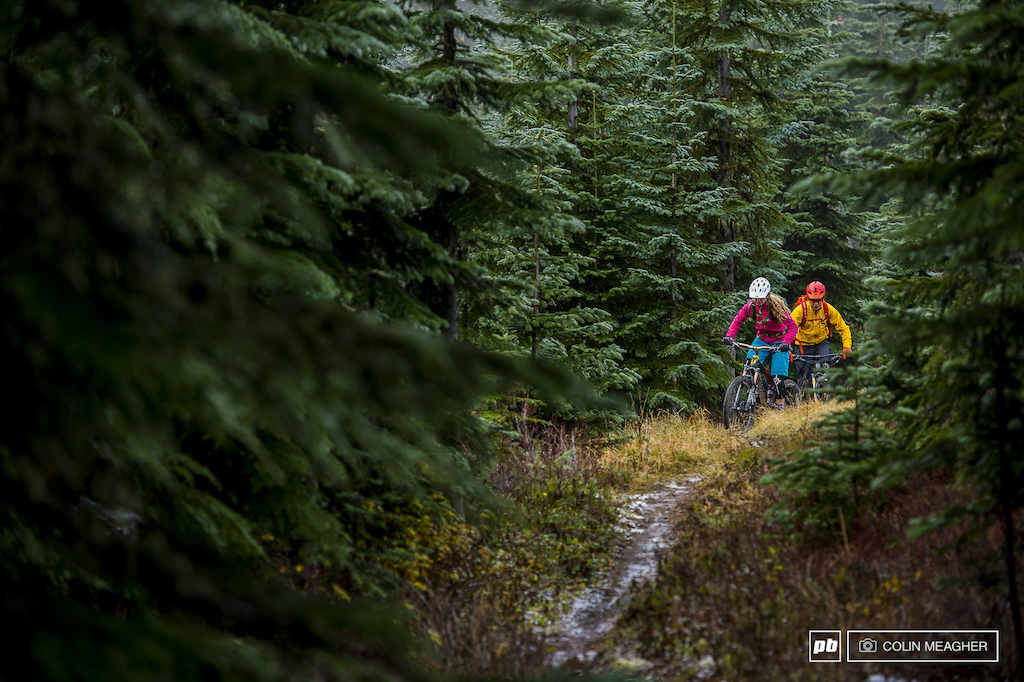 Jenny Konway and Jameson Florence ridge top through a skif of sleet... how many more rides are left before the snow shuts it all down