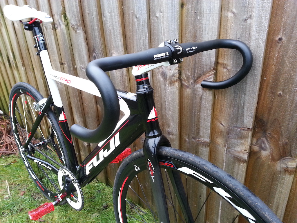 With Deda 120mm stem and Planet X compact drop bars. I need to find a brake lever to run this setup.