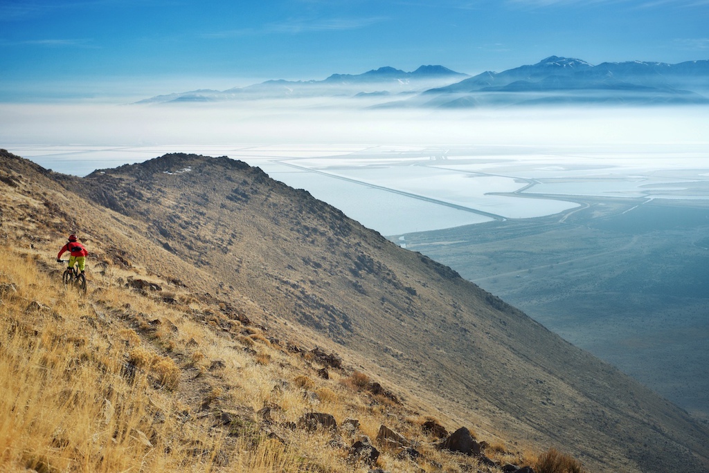 Riding bikes on an island in the middle of the Great Salt Lake has to be one of the most surreal experiences i ve ever had. After a brutal climb you get miles of flowy singletrack with views like this. Not too shabby.