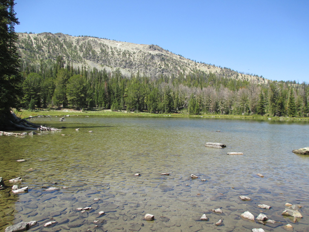 Photo from outlet of Swift Lake with Continental Divide in background.