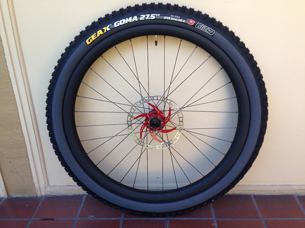 Geeks Goma 2.4 on 40mm Nextie 27.5 rim.

They measured 2.5" in casing and a tiny bit less in tread.