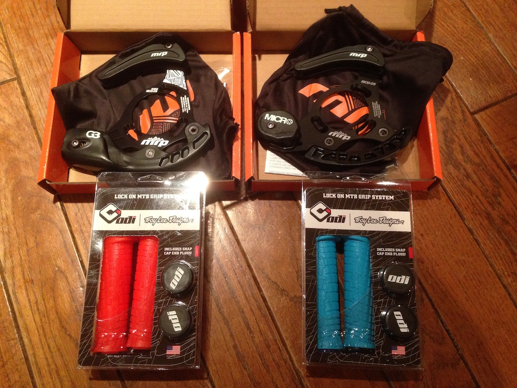 MRP chain guides and colour coordinated ODI TLD grips; orange &amp; blue. Red is still in the mail on it's way!