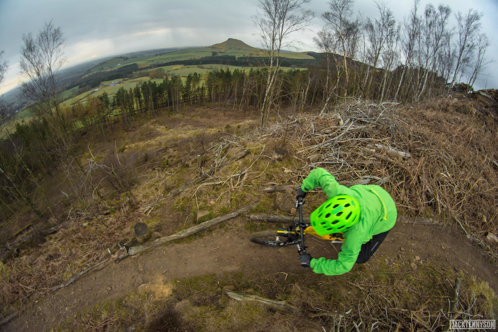 Gloomy skies and bright kit made for a good night to shoot some photos with Oli Riley and his Commencal Meta!