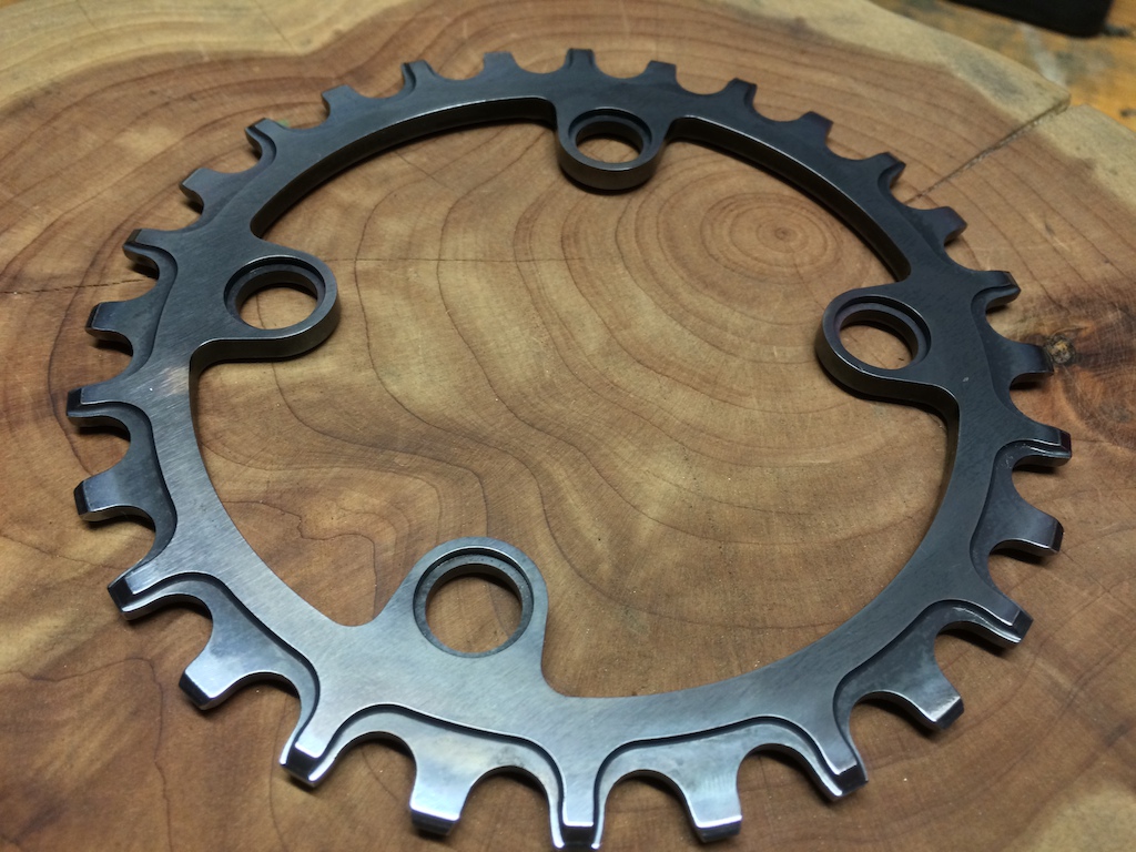 28t XX1 chainring. Made from D2 tool steel. Heat treated to Rockwell c52, then cryo-tempered at -300F deg for 22 hours to make it even more wear resistant.