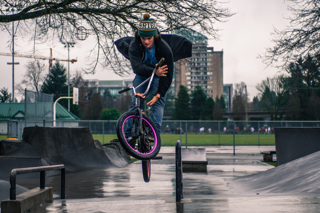 Rail grind to barspin.....in the wet