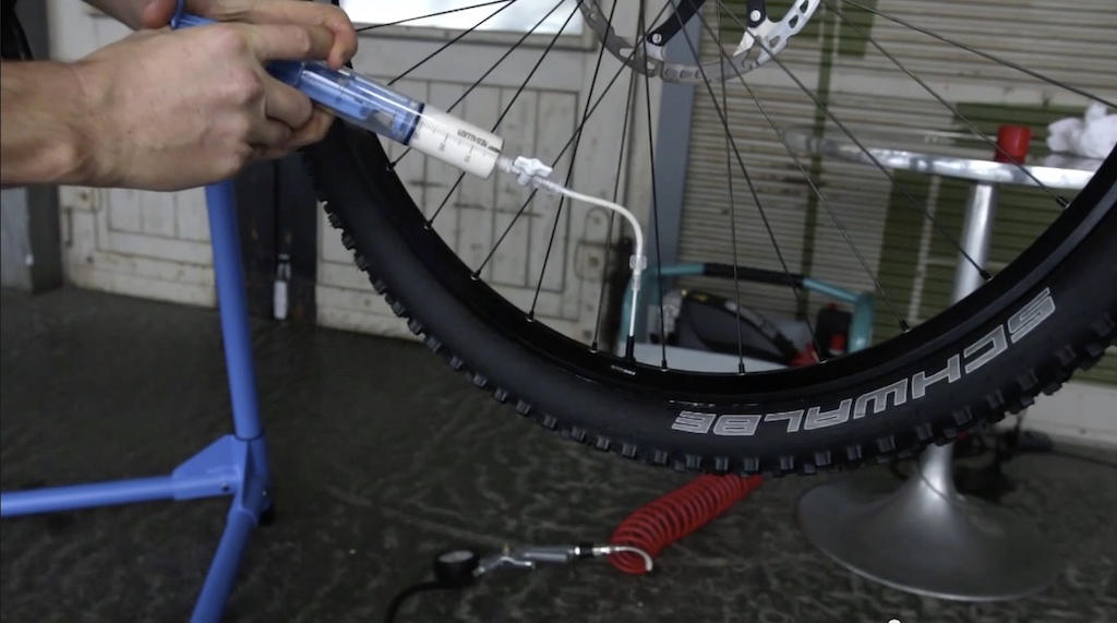 add sealant with the milKit applicator without removing or deflating the tire