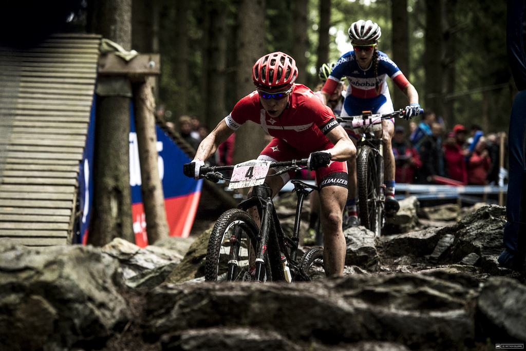 Annika Langvad finding her rhythm in the Mitas rock garden. She finished fifth.