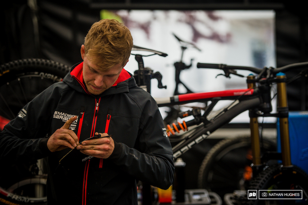 The World Champion's number 4 race plate getting prepped in the Saracen Madison camp.