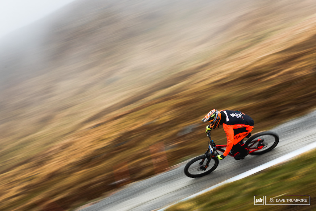 Brendan Fairclough up to speed and looking fast as he drops into the foggy cloud layer that filled in much of the wide open upper slopes today.