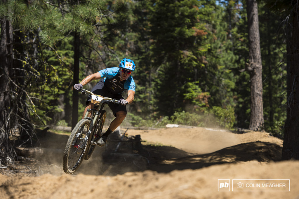 Yet another rider from another era who hasn t lost that competitive drive yet Flyin Brian Lopes on stage 3 taking the transfer from a double into a berm.