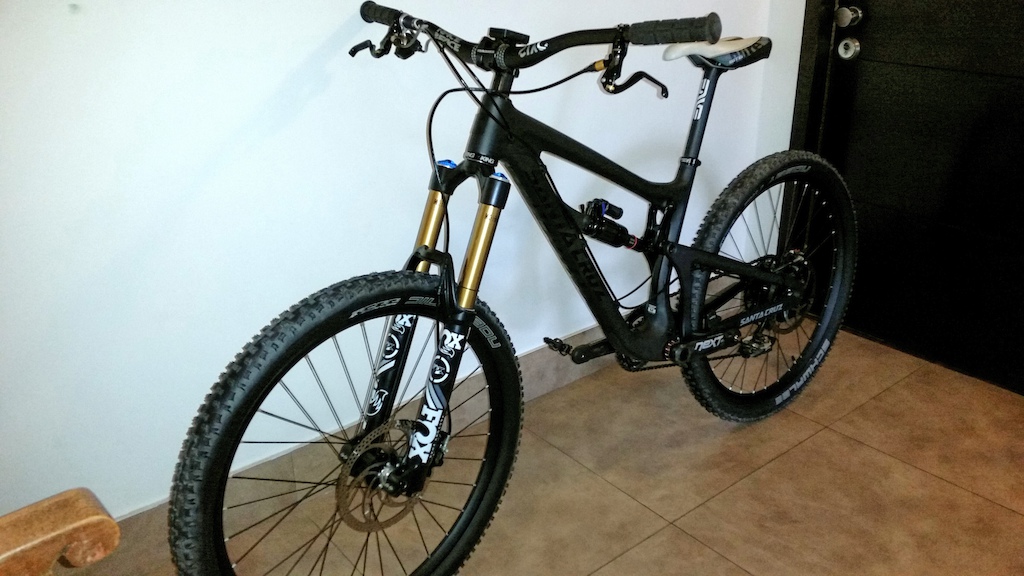 Nomad 2015, with 2015 170mm Fox Float fork. Hadley Hubs., 2 rings 26 &amp; 38  Race Face Carbon Nextt Clinch, Shimano M986 long  cage with 10mm extra screw to make the 42 T One Up Component work. Change the 15 cog for the 16 One Up Comp. no 17 cog. (2x10). All bearings and BB are Enduro XD/15 Ceramic. 35 x35 Face Face Sixc Carbon handlebar, and Atlas 325mm Stem. Formula the One brakes 203mm rotors, Enve seatpost. WORKS GREAT, with the hand as a front deraulliier climbs like a mule, and goes down like as a Nomad