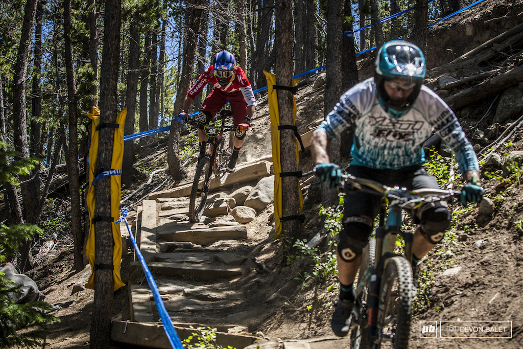 Curtis Keen quickly approaches Mike West on the infamous Helter Skelter left hand turn.