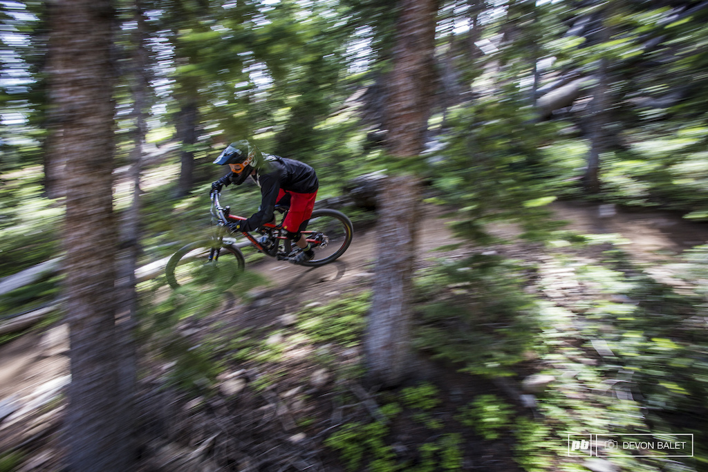 Blurring through the tight trees on High Speed Dirt on stage 4.