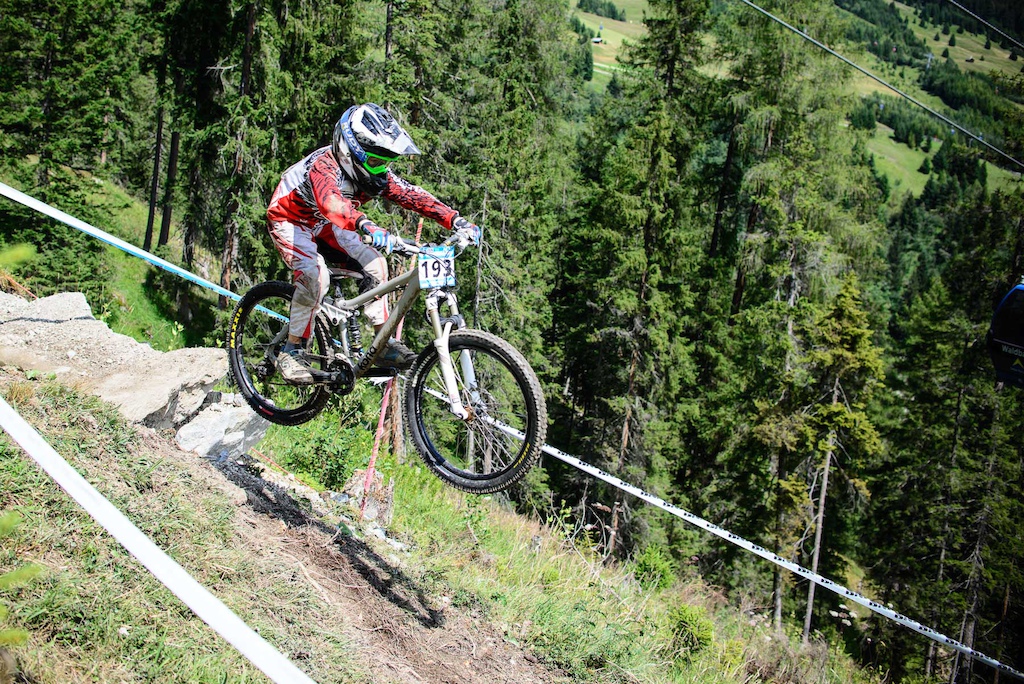 Contestants race down the downhill track of the Bikepark Serfaus-Fiss-Ladis during the Kona MTB Festival Serfaus-Fiss-Ladis.ROOKIES in Tyrol, Austria, on August 10, 2014.Â Free image for editorial usage only: Photo by Felix Schueller.