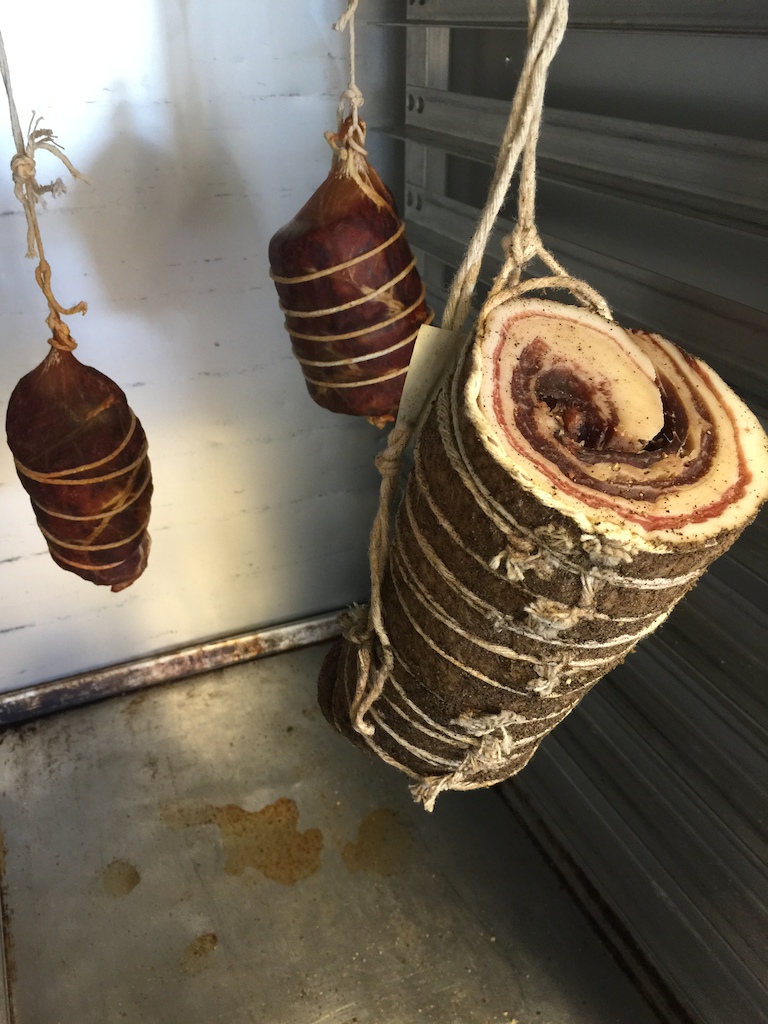 Capacola Ham, Pancetta... WTH, some of each will be in your hands in about 2 more months.  The Capacola needs to go a bit longer.