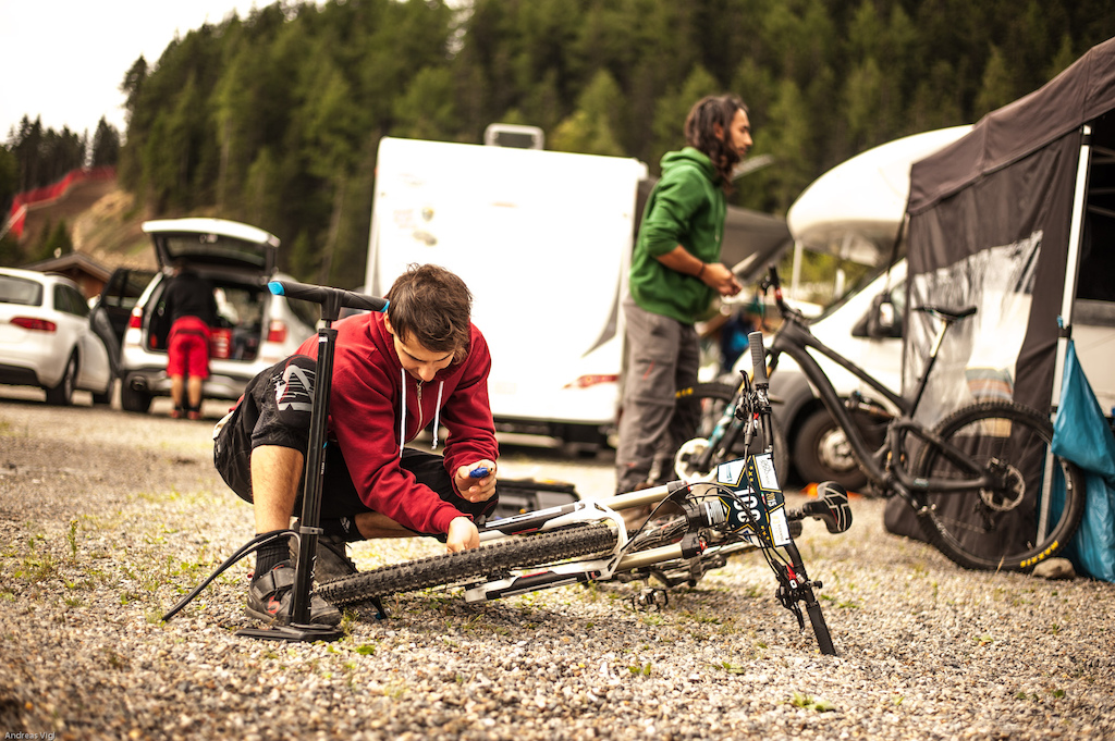 Competitors in the pit area at the 3rd stop of the European Enduro Series at Reschenpass, Austria, on July 25, 2015. Free image for editorial usage only: Photo by Andreas Vigl