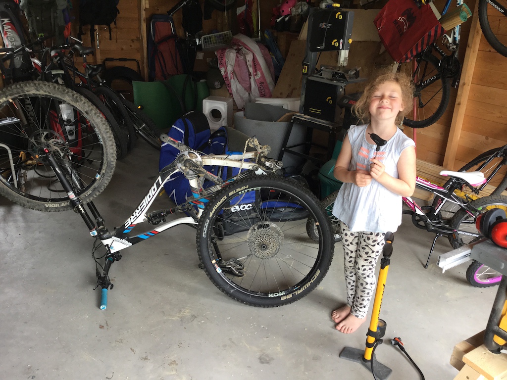 getting some top notch help working on the bike from my adorable little sister...