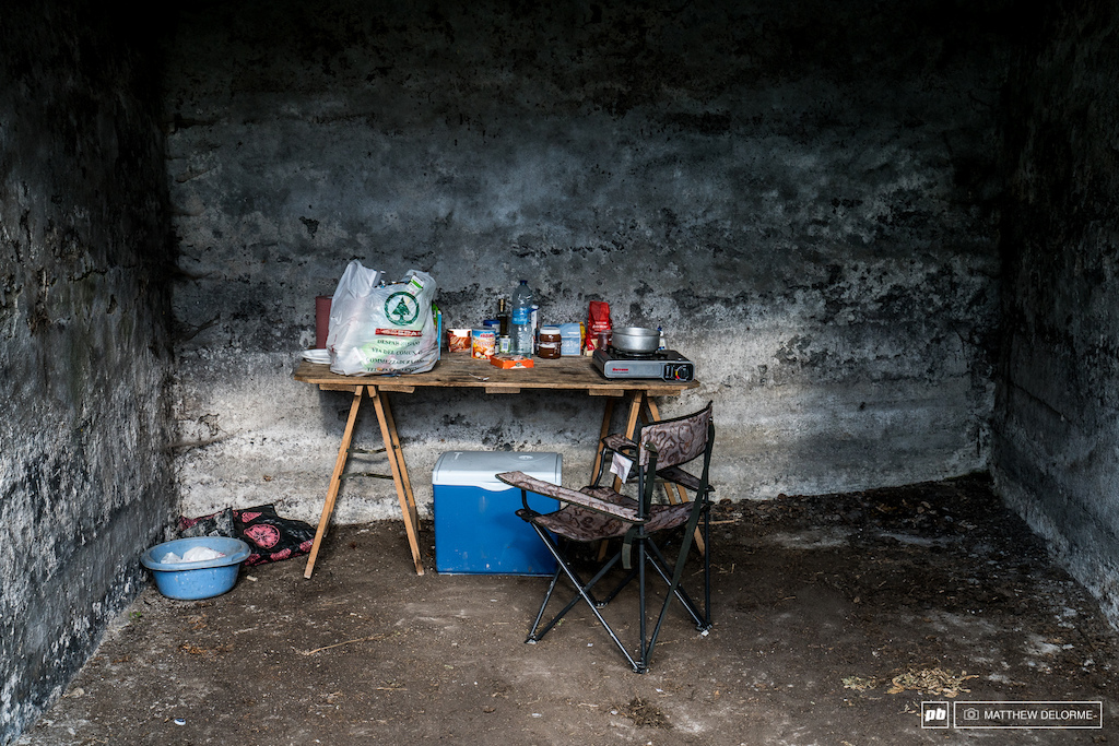 World Cup racing isn't all glamour. This kitchen setup in a rustic, open basement is all you need to keep warm and nourished, though.