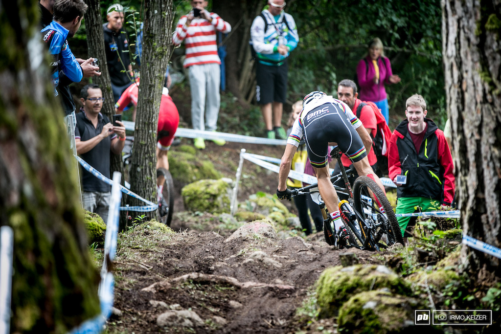 Absalon giving it all in a slippery descent.