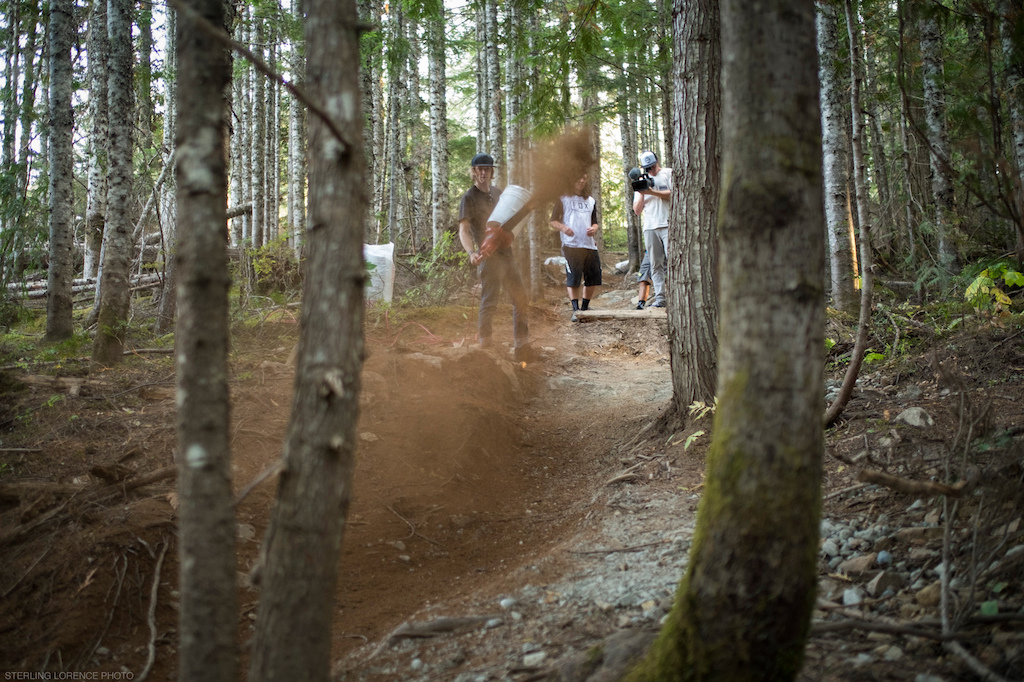 Fraser Newton blowing born pow at Whistler Mountain Bike Park for the dirt blizzard segment of Unreal by Anthill films.