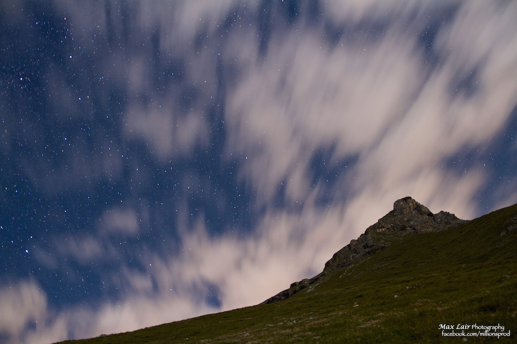 Hiking up under the star and moonlight to reach the peak by sunrise and time-lapse the whole thing as the first rays shoot over the surrounding peaks.