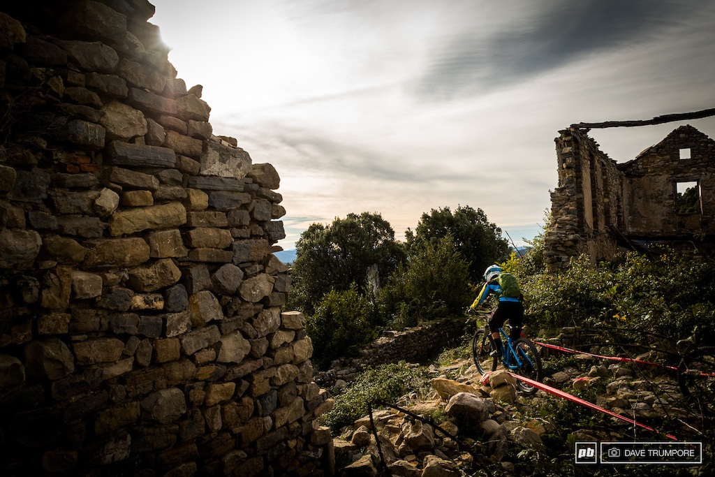 Katy Winton rides through an old ruin in Morcat that marked the starts of stage two.