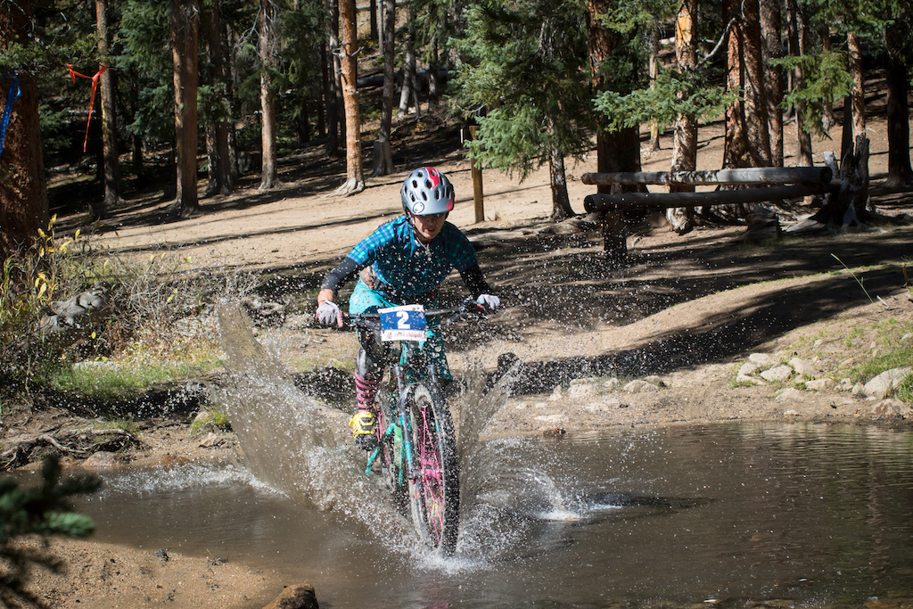 After getting to a semi normal elevation there became many creek crossings. This one in-particular was very refreshing and welcome during such a long stage. Possibly the longest Enduro stage in the world currently. Pro woman 3rd place winner gets wet.