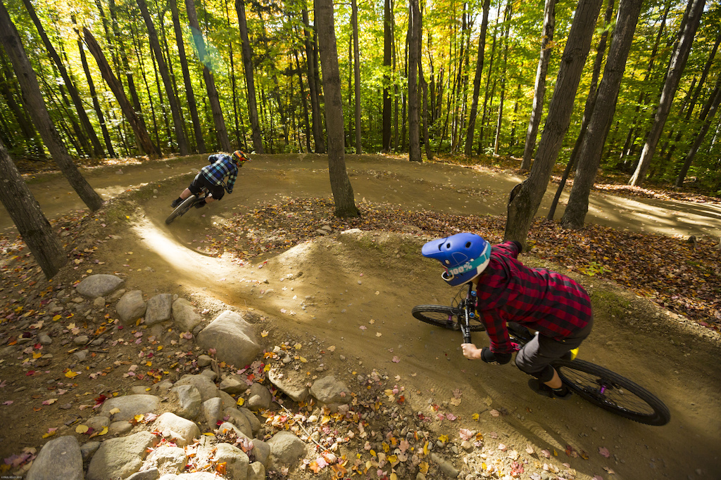 Becky Gardner (front) and Trish Bromley on Cat's Paw at Highland Mountain Bike Park in Tilton, NH. (Photo By Paul Kelly)