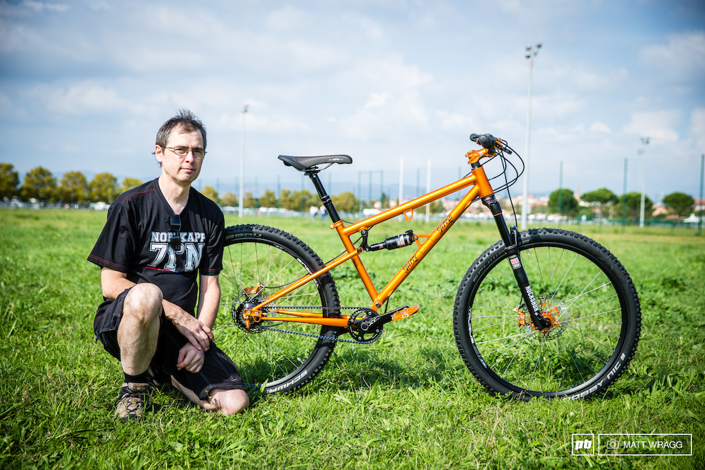 Pierre Perrin was at the show with his first ever mountain bike - a steel-framed full-susser that is pushed along by a combination of a Gates belt drive and a Rohlhof geared hub. Younger readers may not recognise the suspension layout, but anybody who was riding in the wild and wonderful days of the 1990s will instantly recognise the unified rear triangle (URT). In the early days of full-suspension bikes, many designers didn't know how to deal with chaingrowth and other chain forces, so they solved the problem by including the bottom bracket on the swingarm. While this many have completely solved any chain issues, what it did mean was that your bottom bracket was moving under you as your suspension worked... The fact that younger readers may not have seen one of these before should tell you all you need to know about the development of suspension and the URT. However, Pierre has resurrected the layout to solve the problem of mounting the carbon belt drive. This is his first bike, but one can be yours with fully custom geometry for 2,000 Euros (minus belt drive and Rohlhof hub).