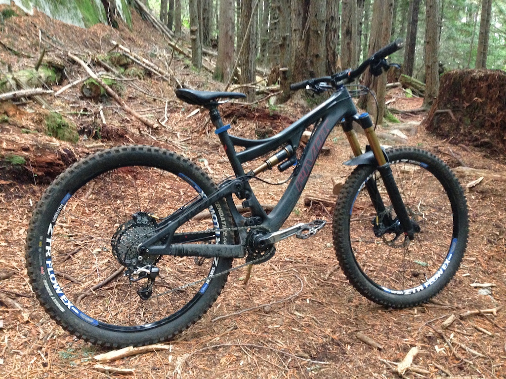 Latest Version of the Mach 6. Shimano Saint Brakes, Saint/oneup 10spd drivetrain, 30T Chromag Cinch ring, kenda Honey Badger DH rear tire (wire bead/Tubeless).

The bike is the heaviest its been, 31.5 lbs, but alo the best it's ever ridden.