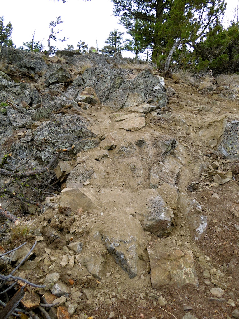 Rocky roll in and an easier ride around. A lot of boulder placing here, along with buckets of dirt over top.