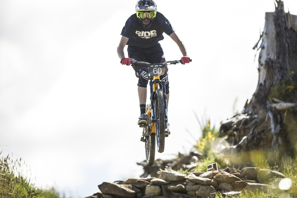 Calum Booth takes the high line during Day 2 of the 2015 Urge 3 Peaks Enduro mountain biking race held in Dunedin, New Zealand. November 29, 2015.