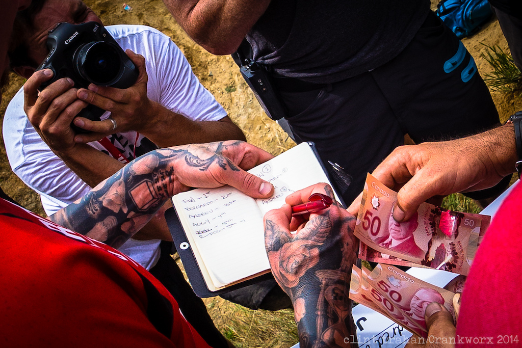 Judges at the Official World Whip-Off Championships consider who will earn a little cash for their whips (Photo by Clint Trahan/Crankworx)