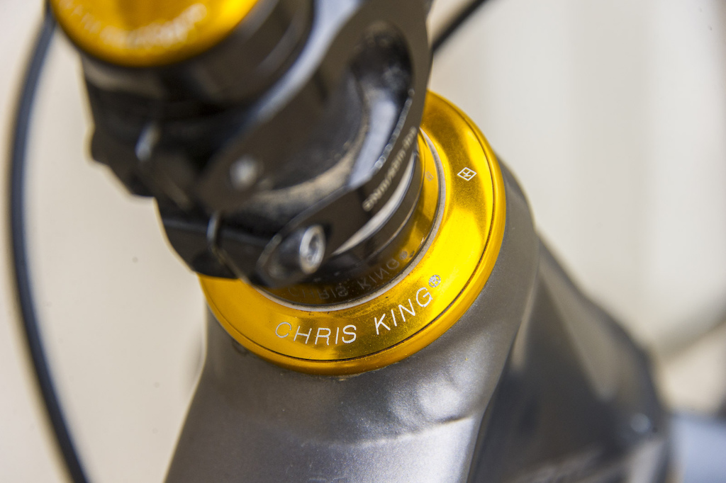Chris King tapered headset in gold.