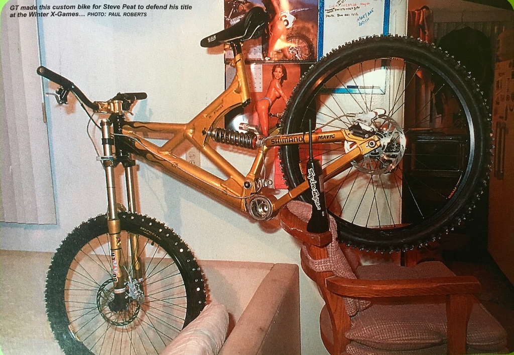 I finally managed to take a picture from an old magazine of Steve Peat all gold winter x-games DH GT DHI bike, check out the spikes. Rockshox, Hope, Michelin, SDG, Troy Lee, Peaty.