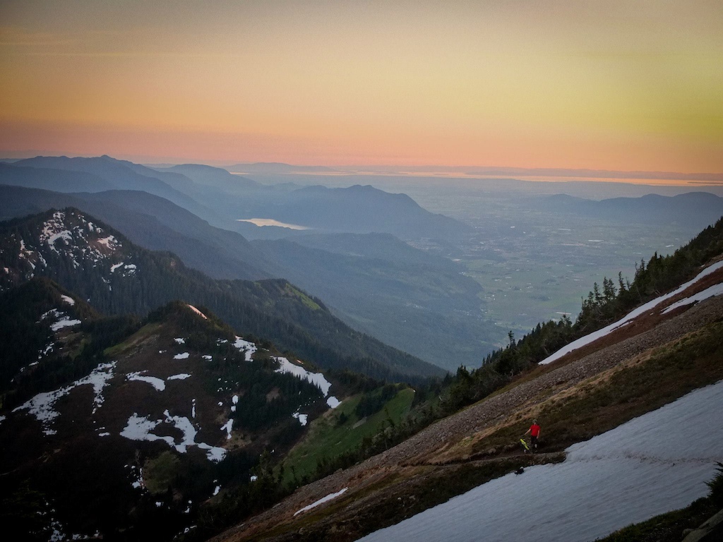 Taking a break whilst riding down Mt. Cheam last spring. Well worth a ride if you don't mind the push to the top.