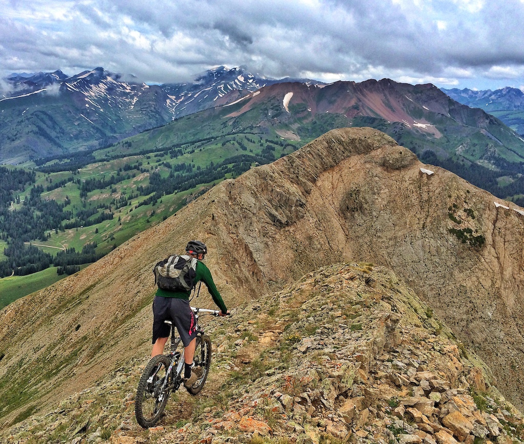 Finding a line down Gothic Mountain summit in Crested Butte, CO.
