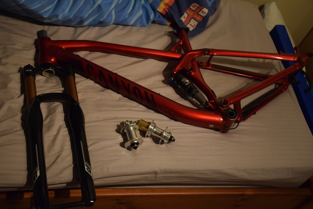 New project/ride for 2016, Canyon Spectral AL in cherry red, so far i've got most of the parts and will post some more pictures another time but for ow this'll be it!