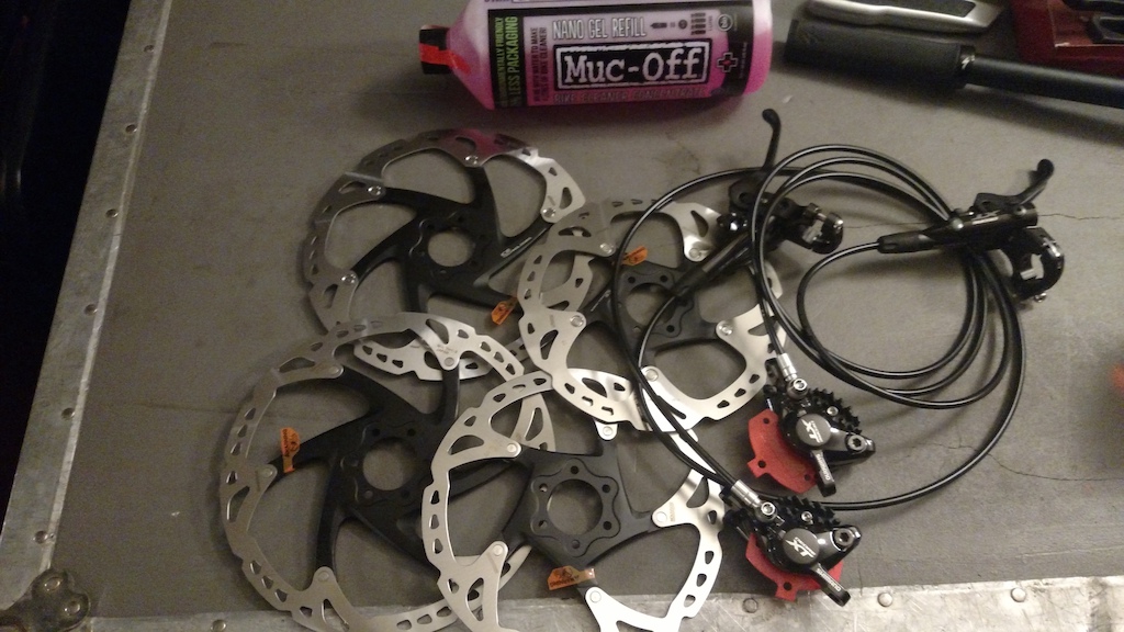 XT M8000 Brakes with 203/180 RT76 Rotors for the Enduro
203/180 RT86 Rotors for the Demo

Saint brakes soon to come!