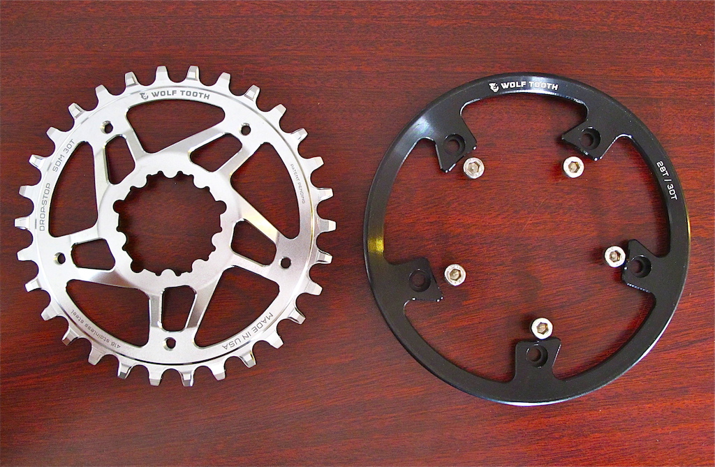 Wolf Tooth direct mount stainless steel chainring for SRAM (left) - http://www.wolftoothcomponents.com/collections/chainrings/products/stainless-steel-direct-mount-for-sram-gxp-cranks-and-long-spindle-bb30  

Wolf Tooth Direct Mount Bashring for Stainless Steel Chainrings (Right) - http://www.wolftoothcomponents.com/collections/chainrings/products/direct-mount-bashring-for-stainless-steel-chainrings
