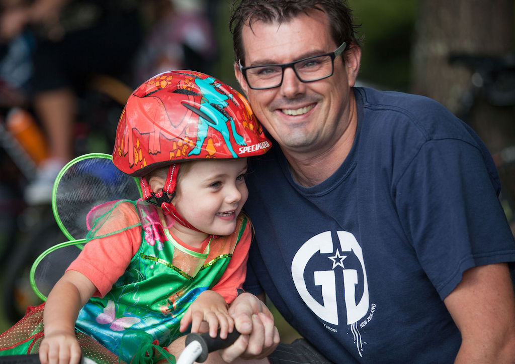 The annual Rotorua Bike Festival is about all bikers. Local Mark Coker, takes time out from railing the Whakarewarewa trails to have a Dad moment at the Sport Bay of Plenty Family Fun Ride.
Photo: Alan Ofsoski
