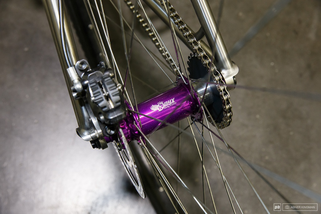 The 36 spoke Onyx hubs are laced with 371mm 14 ga. straight spokes to unicycle rims that are shod with Vee Rubber 2.25" tires that weight 1625 grams each.