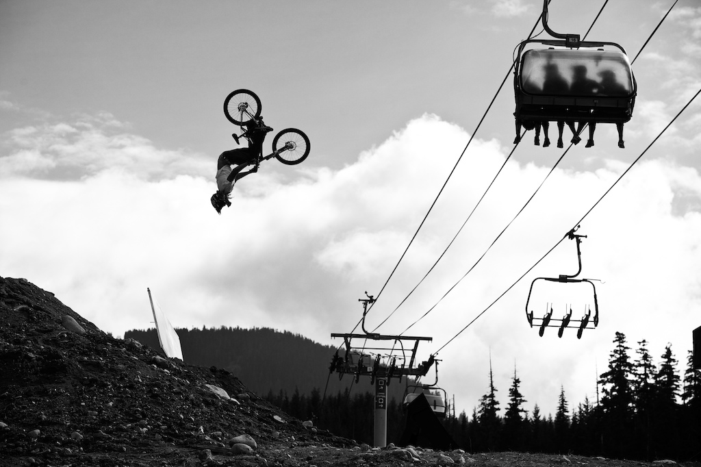 Kelly McGarry backflips his mountain bike during the finals of freeride competition "Crankworx", Whistler BC. Photo: Dan Barham