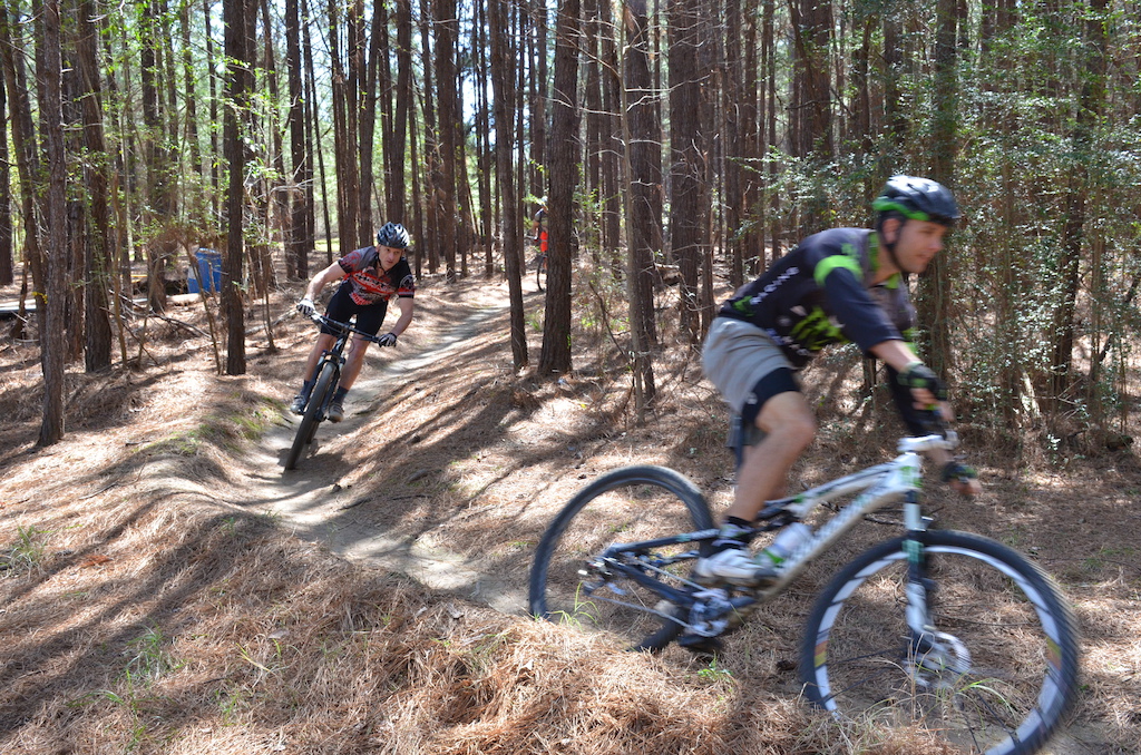 Some locals flowing through one of the long down hill runs.  You will find one of the one of the best trails in the South.  Bike mag. listed it as a top 10 in the South and a must ride.