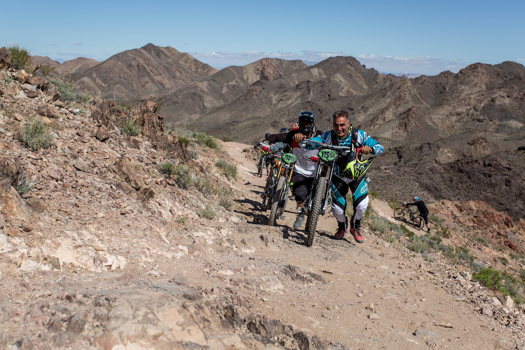 Probably one of the hardest parts of the course, hiking up from the shuttle drop off point.  I found myself at the back of every pack.  These riders from the shuttle behind mine caught me as I hiked up to the top.