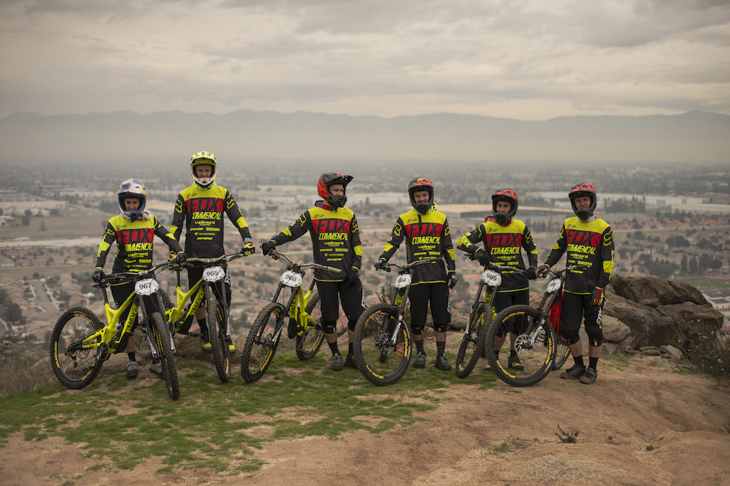 The Riding Addiction team poses for a group shot before dropping into a training run.